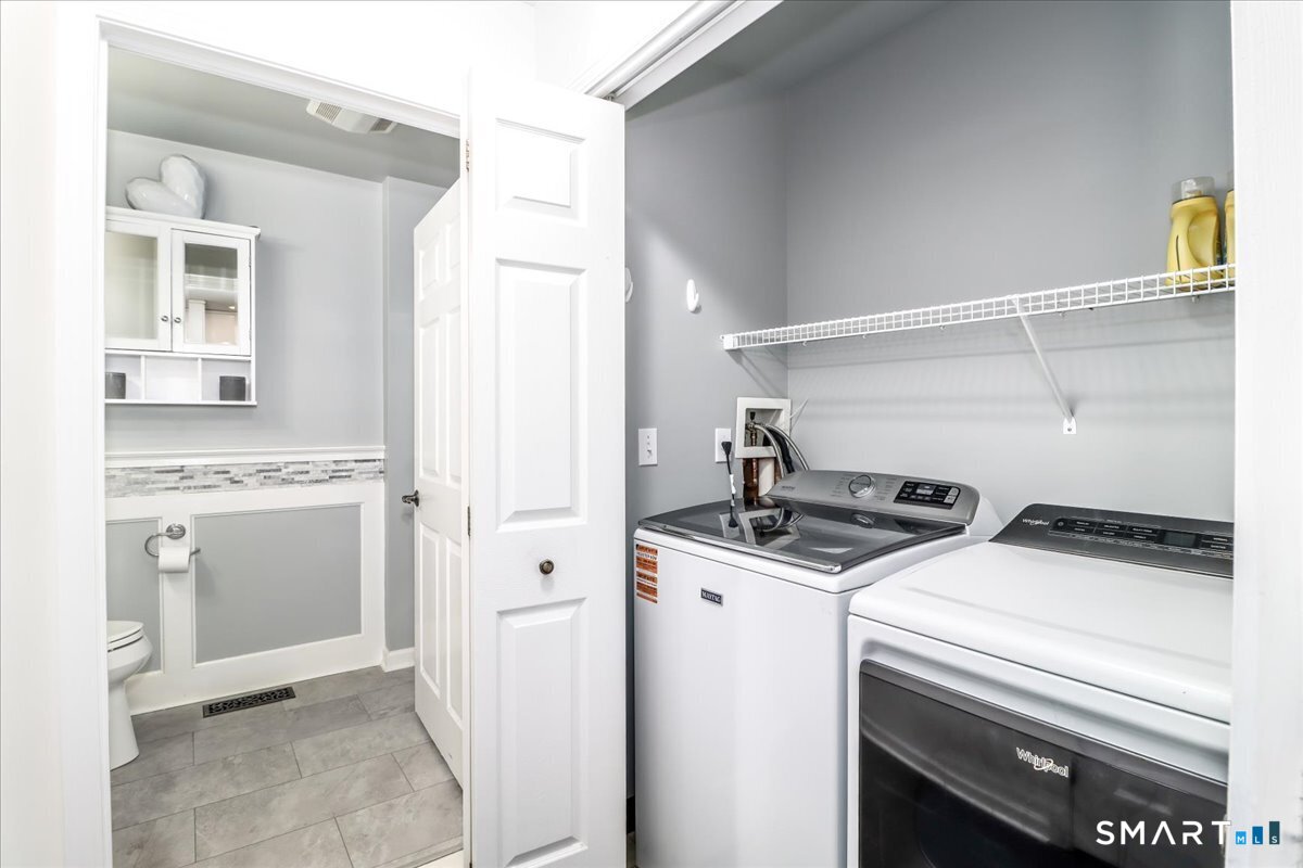 87 Haley Lane, Unit 87 Newtown, CT 06482 - Photo 21 of 39 a utility room with dryer and washer