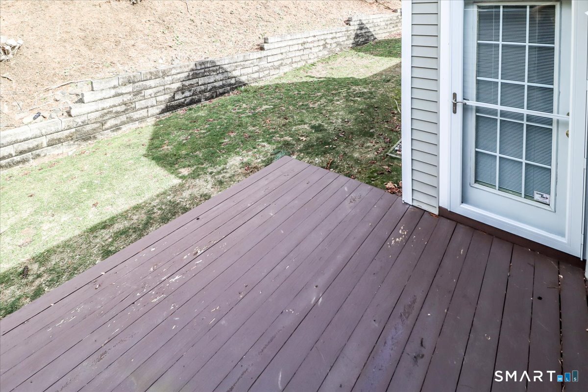 87 Haley Lane, Unit 87 Newtown, CT 06482 - Photo 26 of 39 a view of balcony with wooden floor