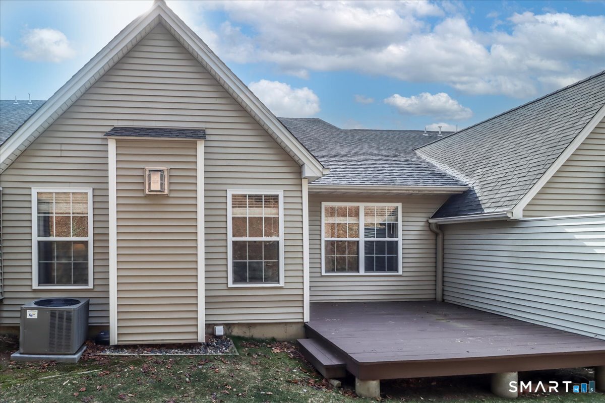 87 Haley Lane, Unit 87 Newtown, CT 06482 - Photo 28 of 39 a view of house with backyard
