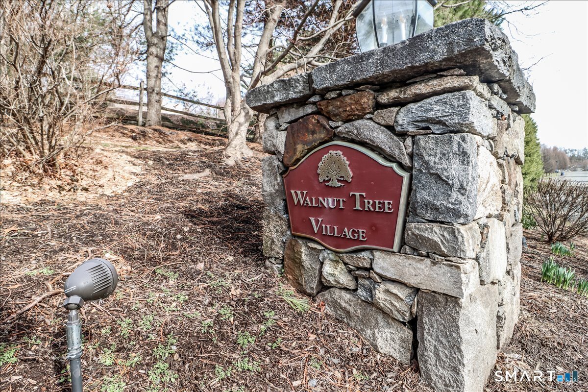 87 Haley Lane, Unit 87 Newtown, CT 06482 - Photo 39 of 39 a sign on the side of a building