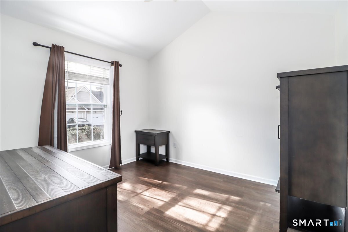 87 Haley Lane, Unit 87 Newtown, CT 06482 - Photo 8 of 39 a view of a livingroom with furniture