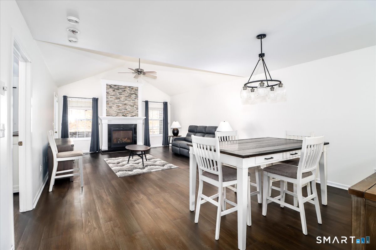 87 Haley Lane, Unit 87 Newtown, CT 06482 - Photo 10 of 39 a view of a livingroom with furniture and a table