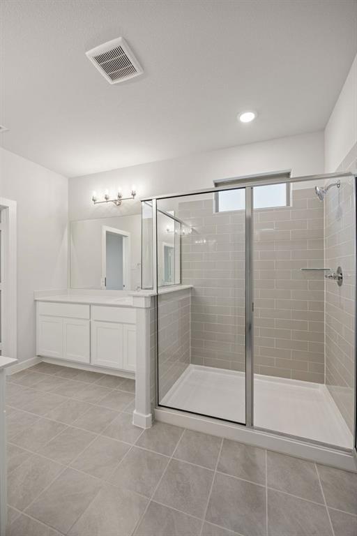 1477 Companero Street Haslet, TX 76052 - Photo 18 of 35 Primary Bathroom in the Wimbledon home plan by Trophy Signature Homes – REPRESENTATIVE PHOTO