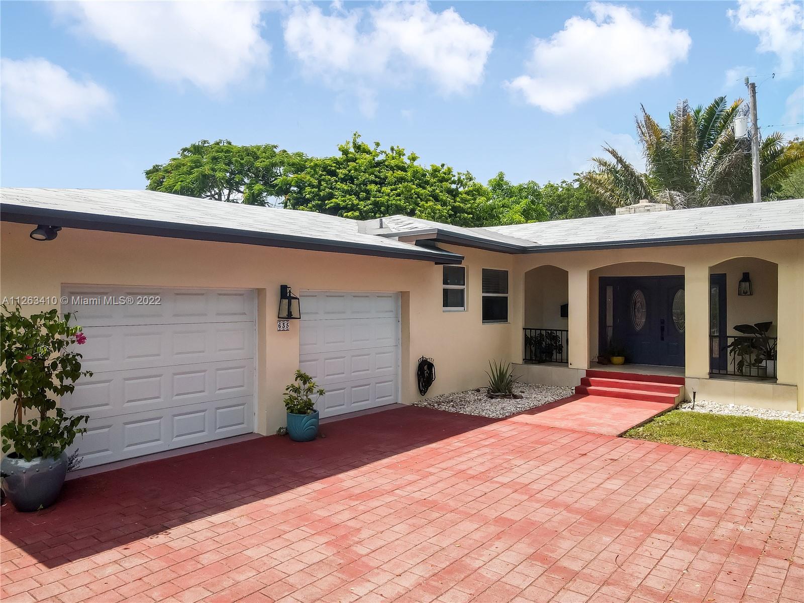 635 Bird Road Coral Gables, FL 33146 - Photo 2 of 35 a view of outdoor space yard and porch
