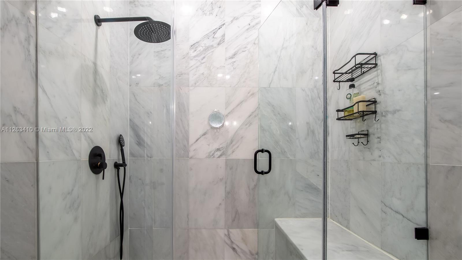 635 Bird Road Coral Gables, FL 33146 - Photo 27 of 35 a bathroom with a shower