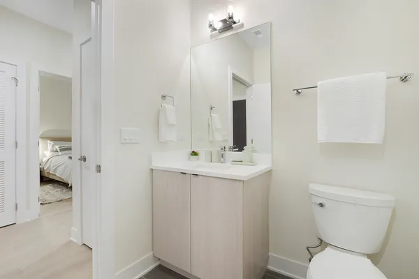 a view of a storage & utility room with dryer and washer