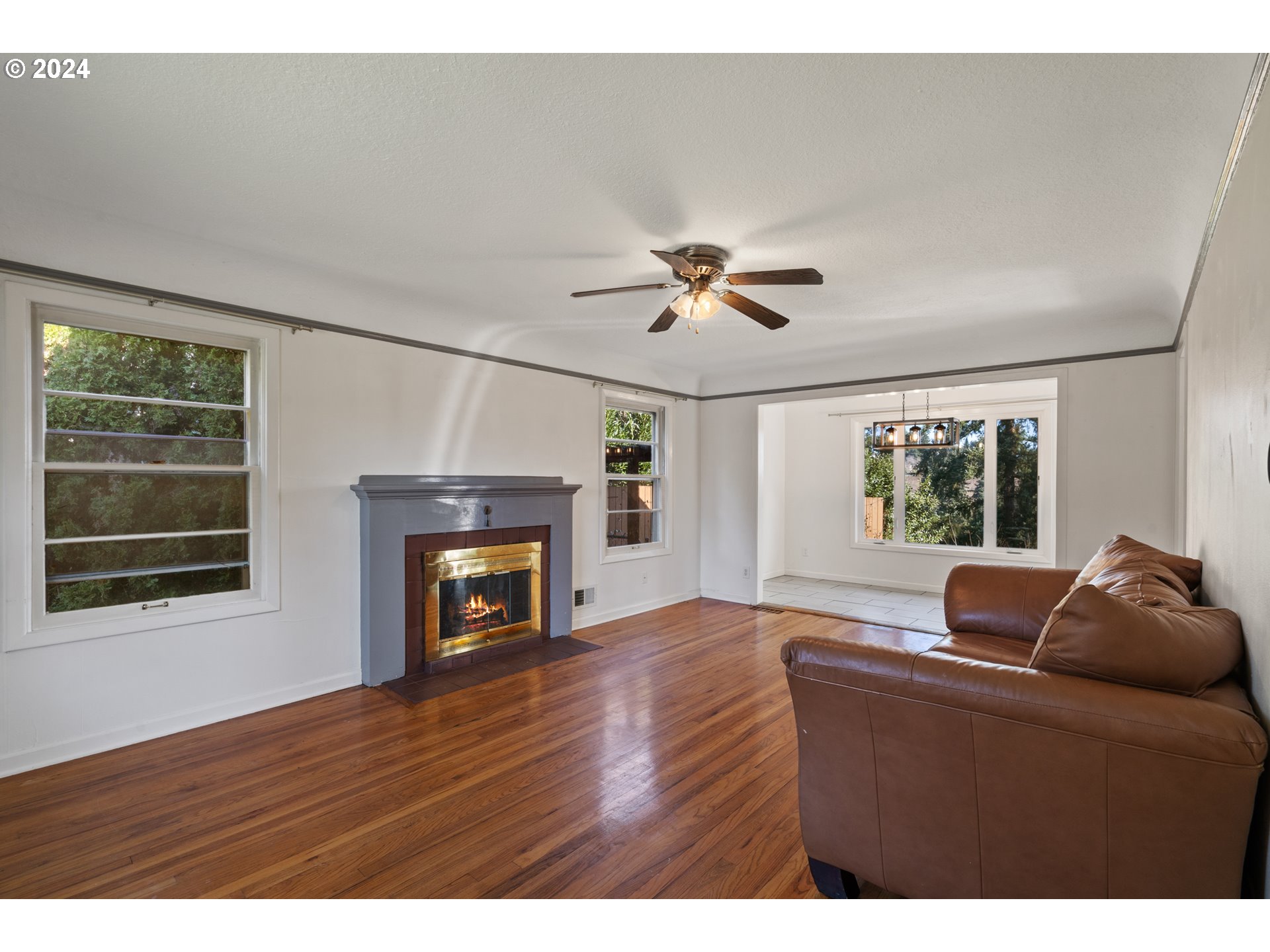 4313 Northeast Valley View Lane Vancouver, WA 98663 - Photo 13 of 48 a living room with furniture and a fireplace