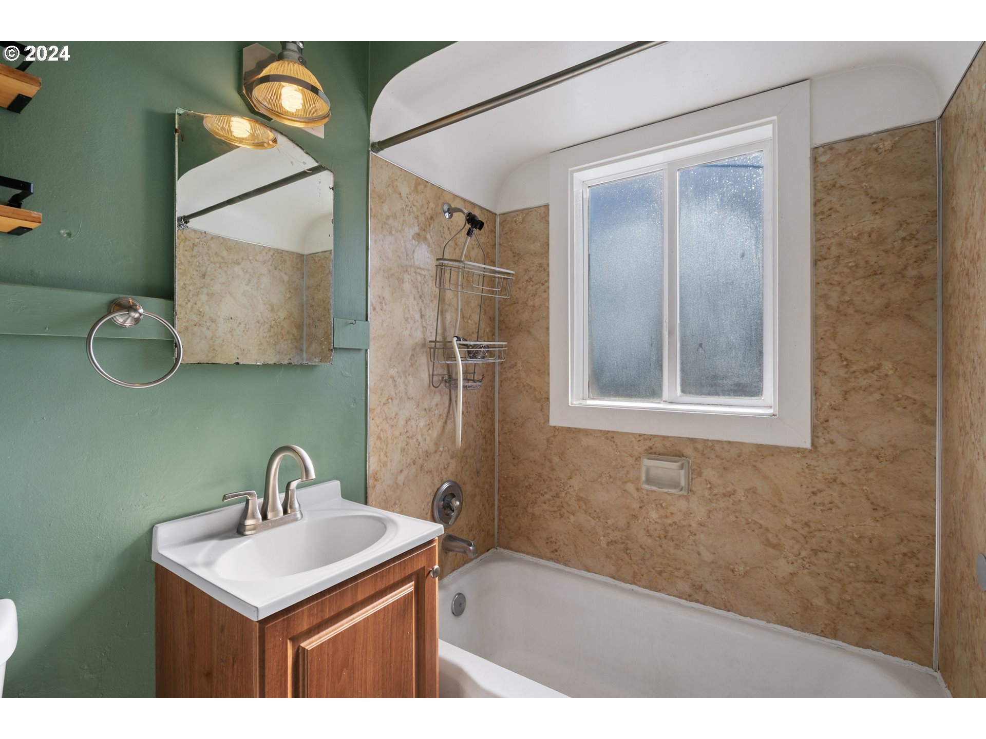 4313 Northeast Valley View Lane Vancouver, WA 98663 - Photo 29 of 48 a bathroom with a sink and a mirror