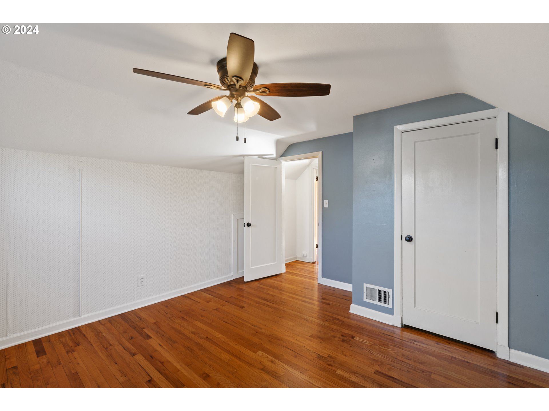 4313 Northeast Valley View Lane Vancouver, WA 98663 - Photo 33 of 48 a view of an empty room with wooden floor