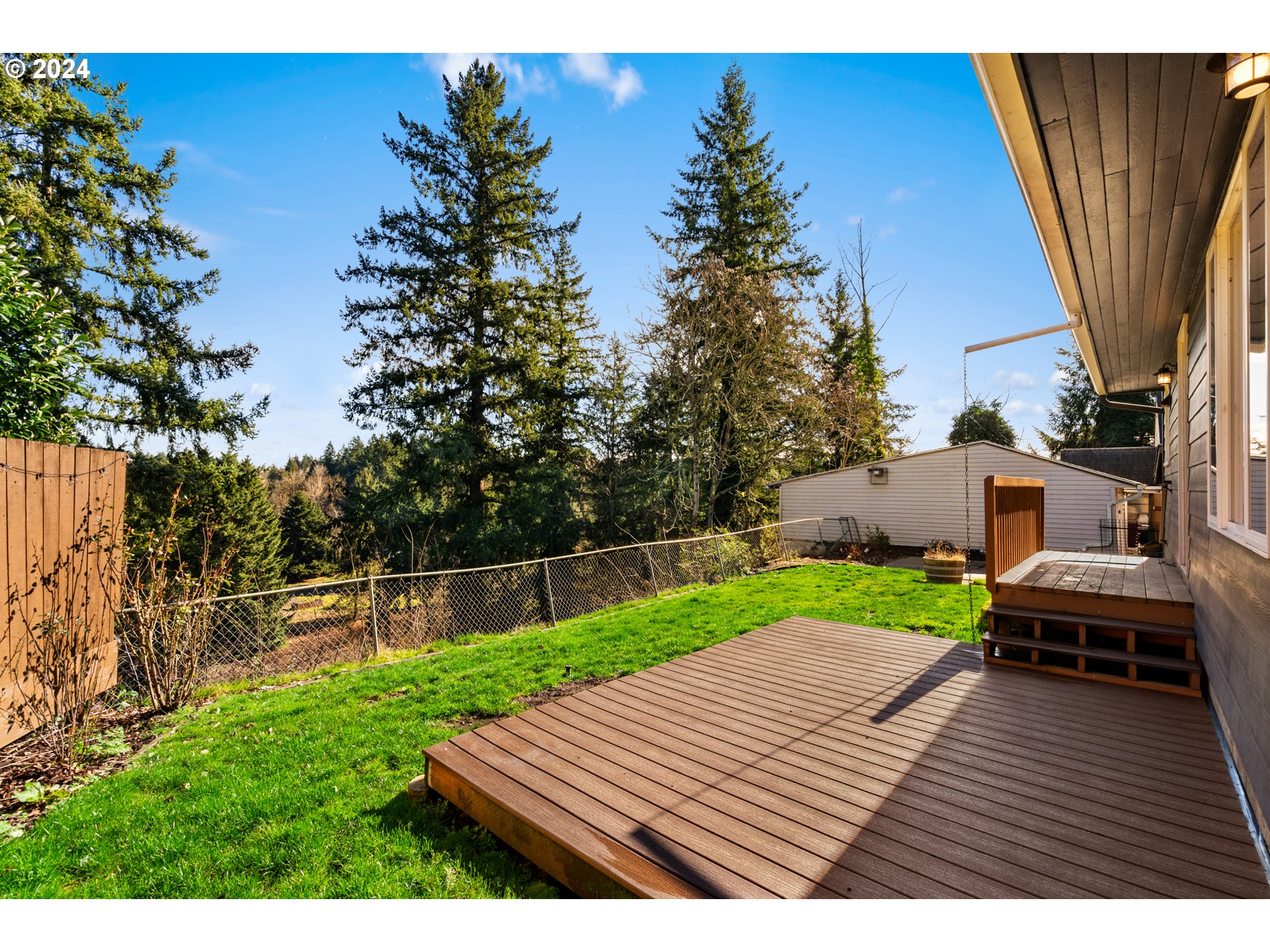 4313 Northeast Valley View Lane Vancouver, WA 98663 - Photo 43 of 48 a view of a wooden deck and a yard