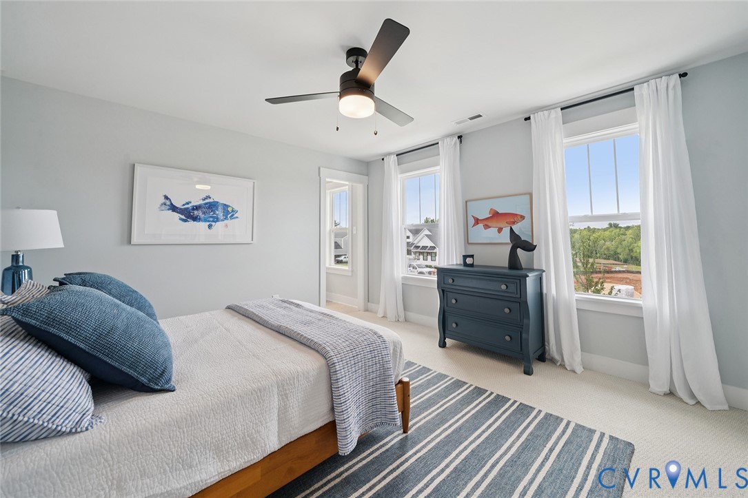 3092 Reed Marsh Drive Goochland, VA 23063 - Photo 21 of 36 a bedroom with a bed and a window