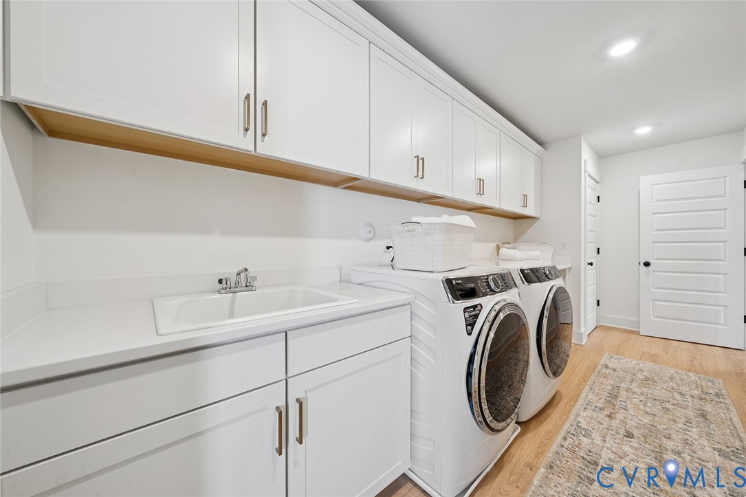 3092 Reed Marsh Drive Goochland, VA 23063 - Photo 25 of 36 a utility room with dryer and washer
