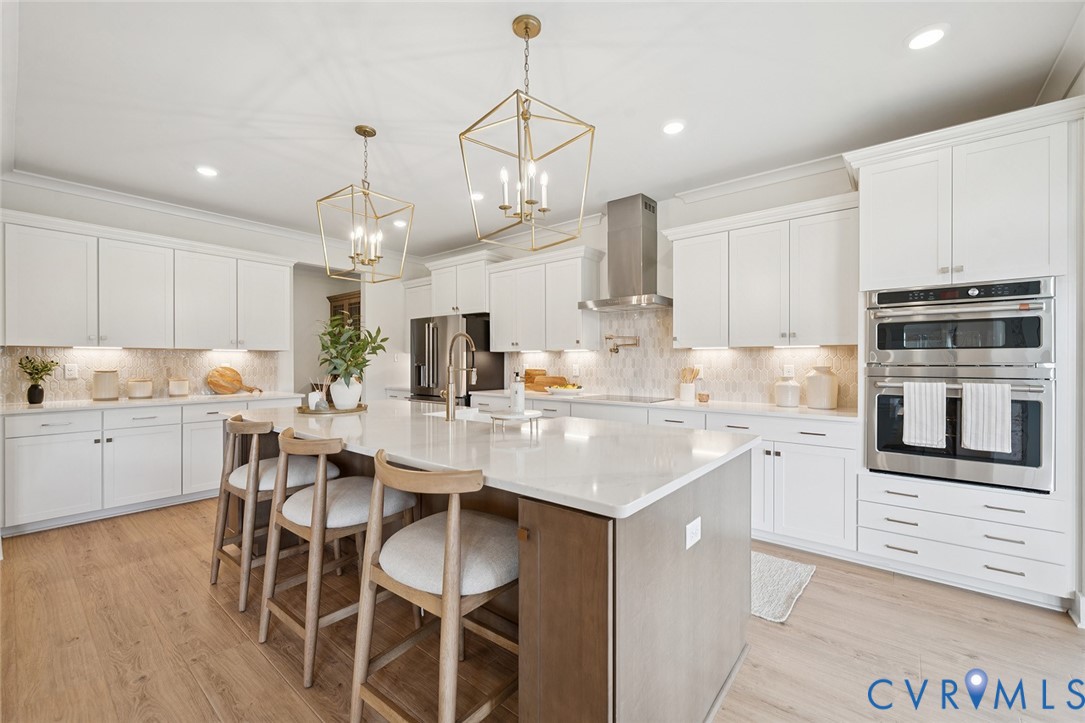 3092 Reed Marsh Drive Goochland, VA 23063 - Photo 4 of 36 a kitchen with appliances a sink and cabinets