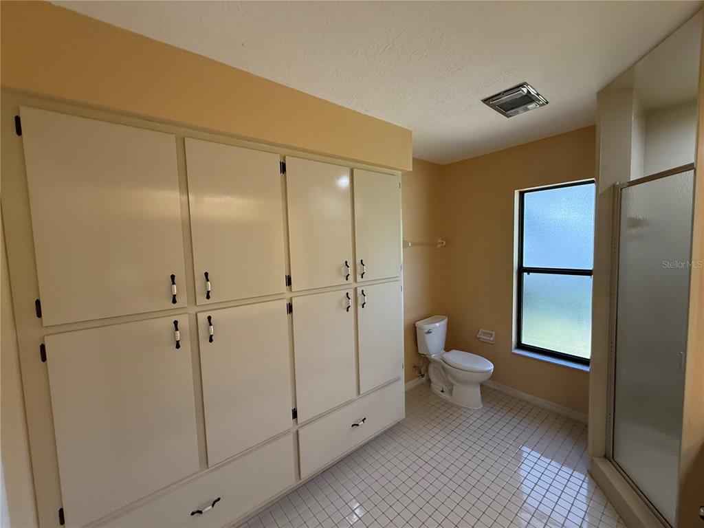 9231 Southwest 197th Circle Dunnellon, FL 34432 - Photo 9 of 12 a bathroom with a shower and a toilet