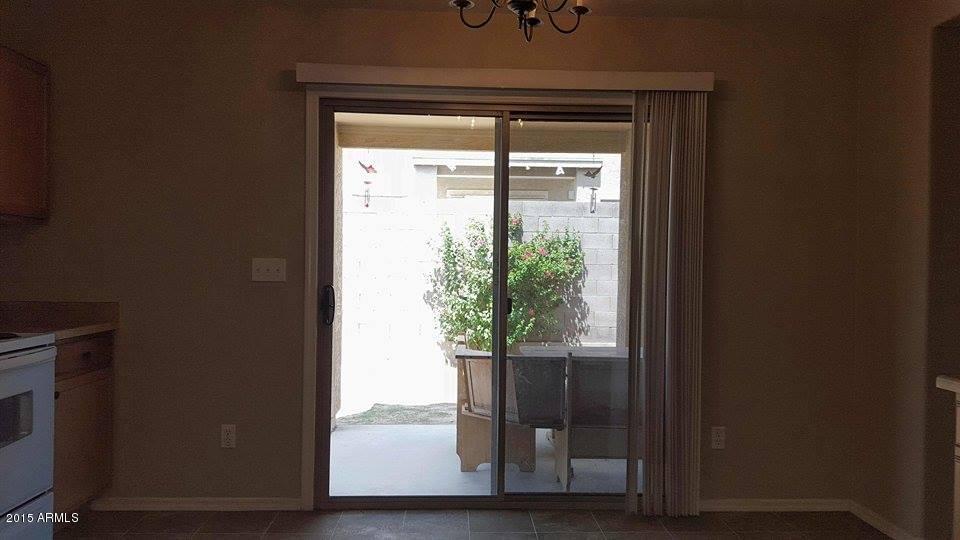 6448 West Beverly Road Laveen, AZ 85339 - Photo 9 of 41 Kitchen/Backyard