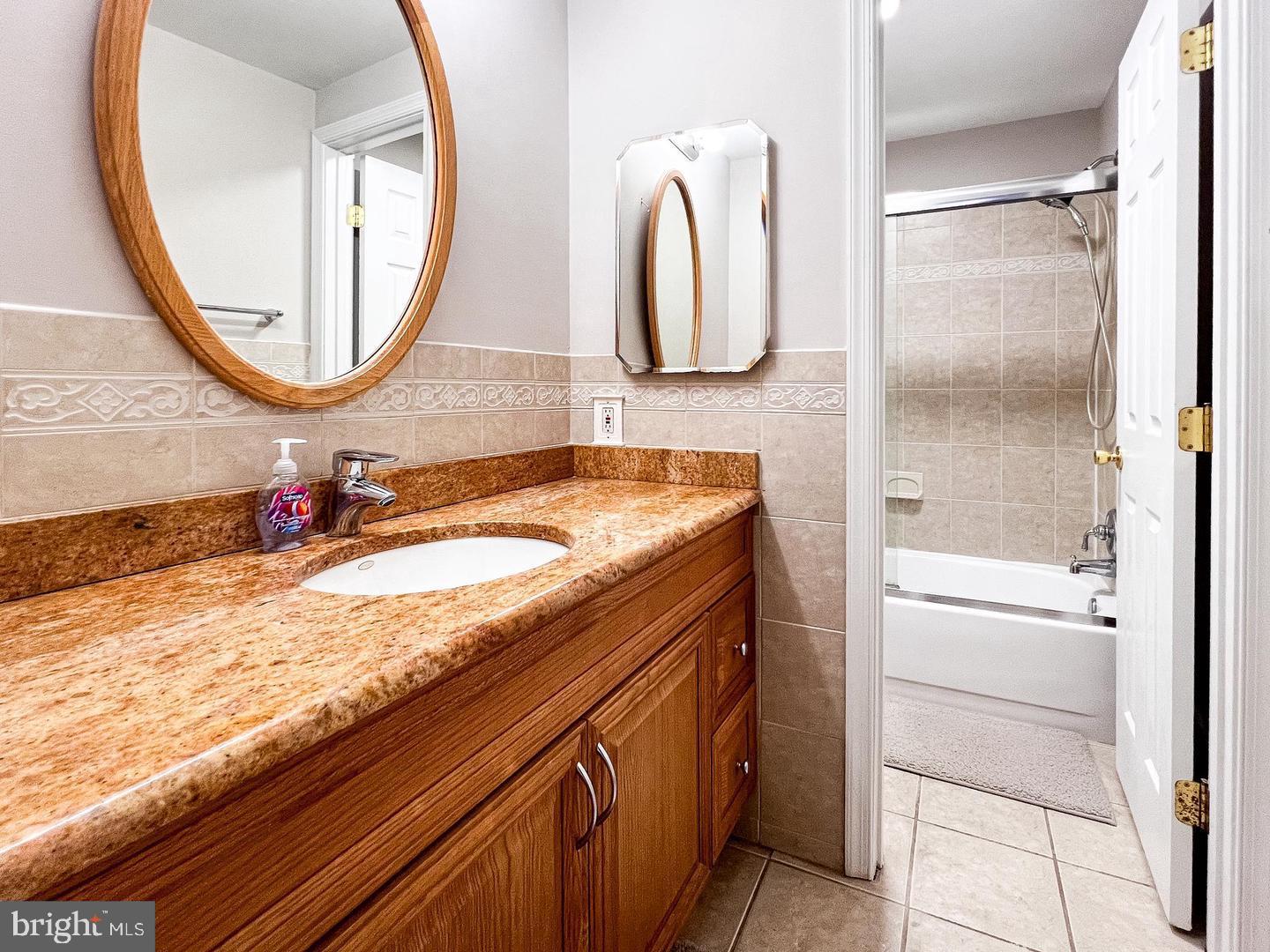 14913 Lear Lane Silver Spring, MD 20905 - Photo 22 of 33 Elegant bathroom with warm tones.