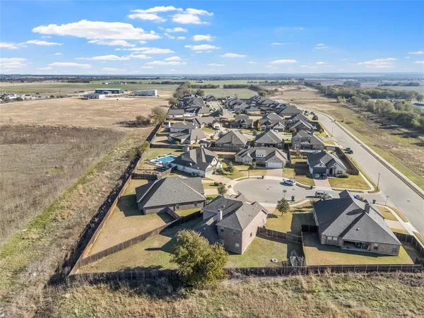 a view of a terrace with wooden floor and city view
