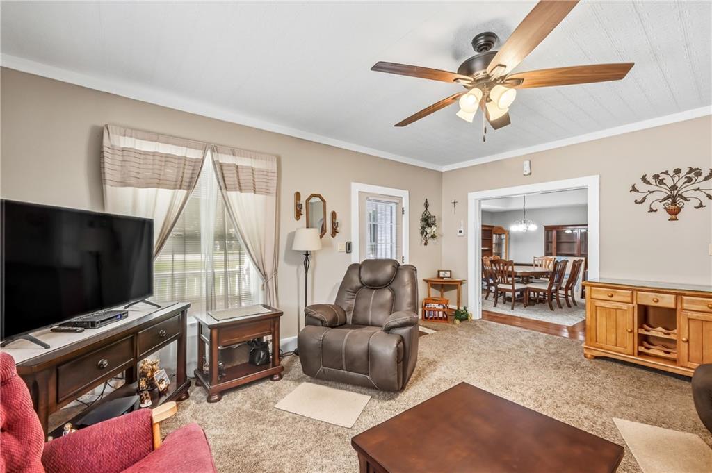 181 West Jamestown Road Greenville, PA 16125 - Photo 22 of 49 a living room with furniture and a flat screen tv