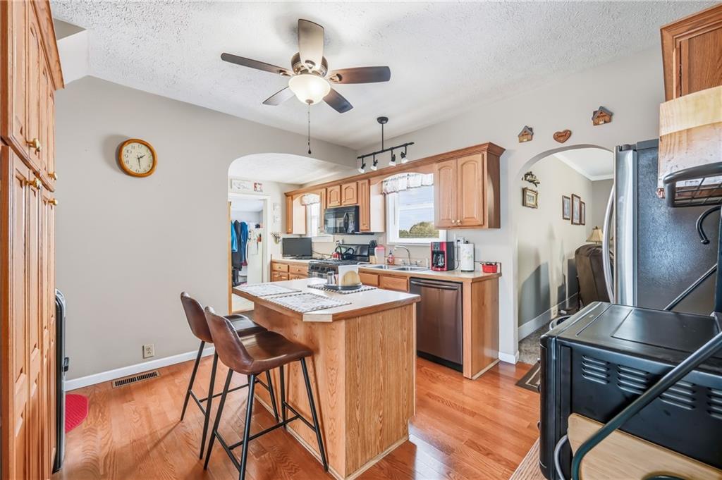 181 West Jamestown Road Greenville, PA 16125 - Photo 28 of 49 a kitchen with stainless steel appliances kitchen island a dining table and chairs