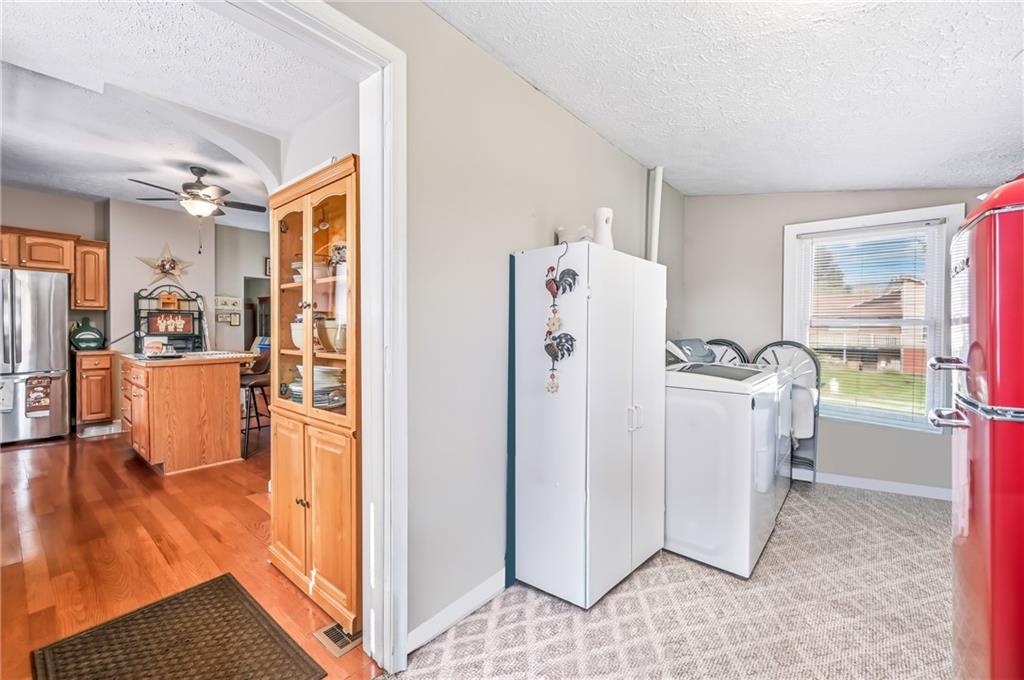 181 West Jamestown Road Greenville, PA 16125 - Photo 31 of 49 a view of a kitchen with refrigerator and wooden floor