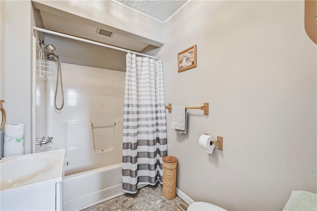 181 West Jamestown Road Greenville, PA 16125 - Photo 34 of 49 a bathroom with a bathtub and a shower