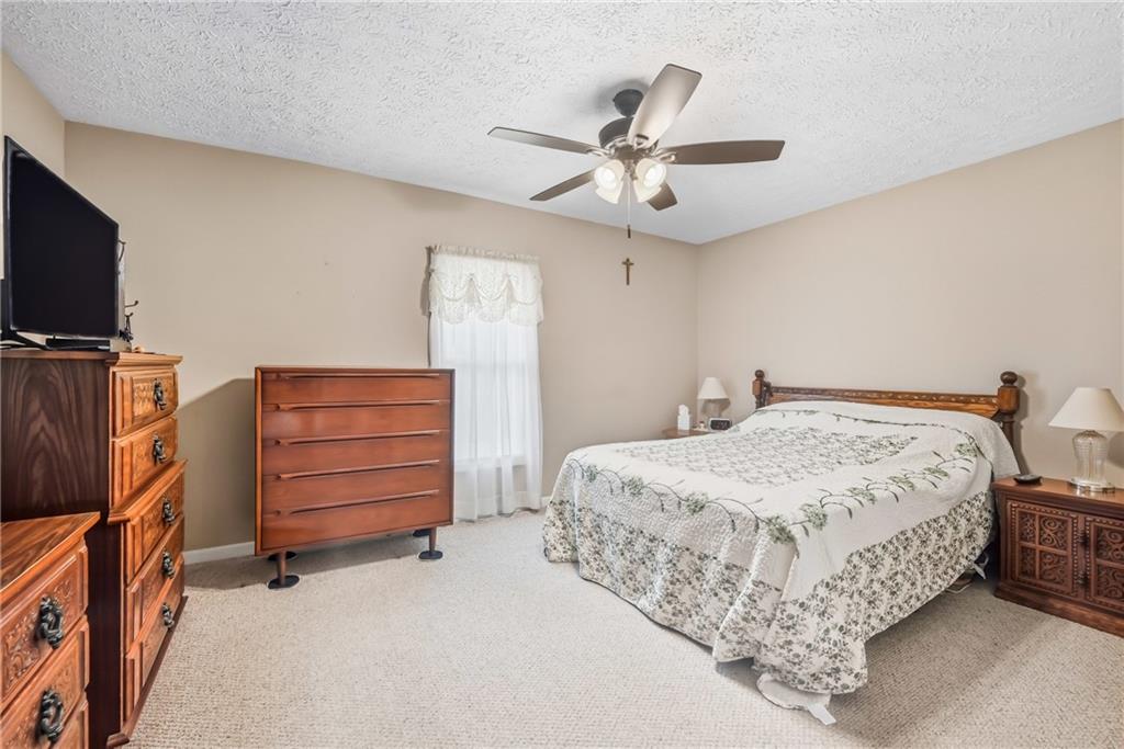 181 West Jamestown Road Greenville, PA 16125 - Photo 37 of 49 a bedroom with a bed and dresser