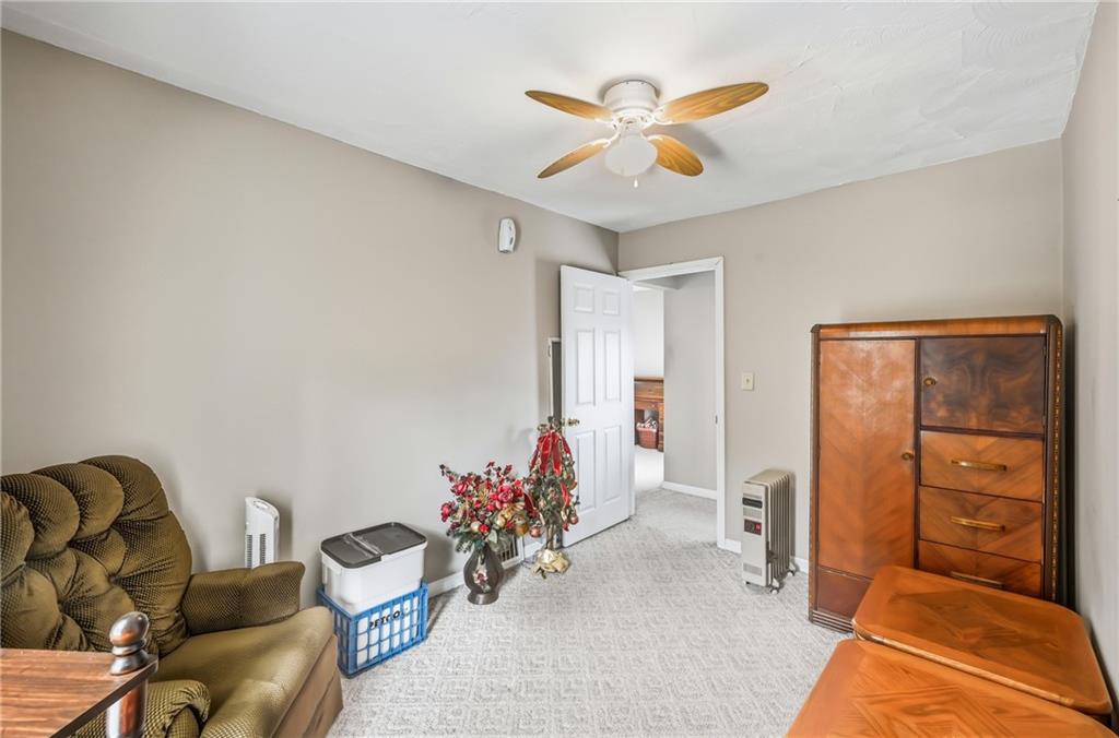 181 West Jamestown Road Greenville, PA 16125 - Photo 40 of 49 a bedroom with furniture and a chandelier