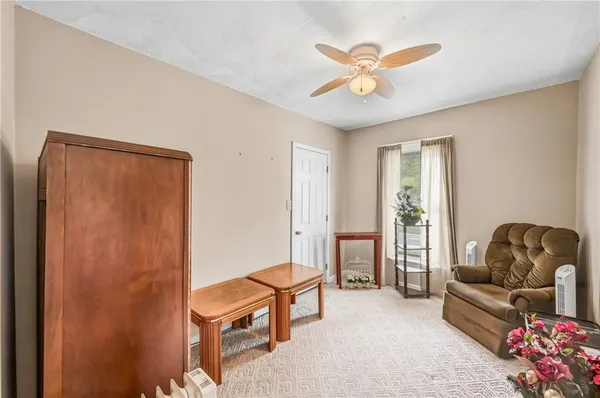 a room with furniture and gym equipment