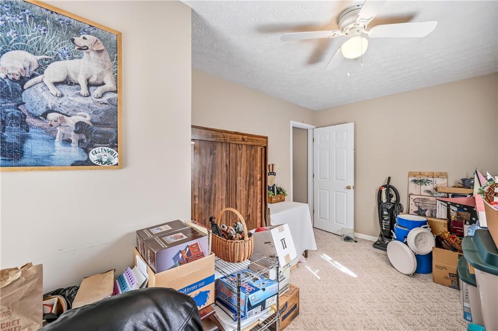 181 West Jamestown Road Greenville, PA 16125 - Photo 44 of 49 a living room with furniture and a chandelier
