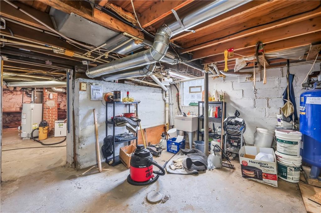 181 West Jamestown Road Greenville, PA 16125 - Photo 49 of 49 a view of a storage room with water heater and racks