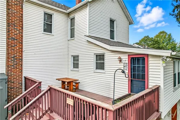 a view of a house with a deck
