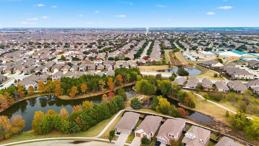5582 Yarborough Drive Forney, TX 75126 - Photo 21 of 29 an aerial view of residential houses with outdoor space