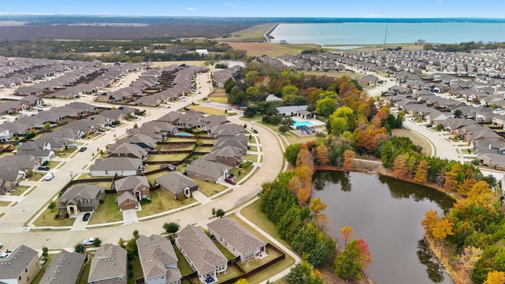 5582 Yarborough Drive Forney, TX 75126 - Photo 22 of 29 an aerial view of residential building and lake