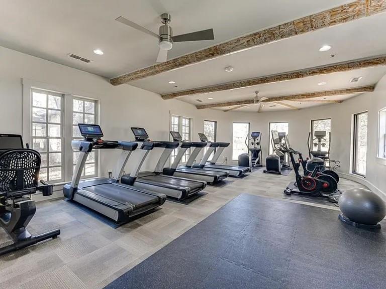 5582 Yarborough Drive Forney, TX 75126 - Photo 28 of 29 a view of a room with gym equipment
