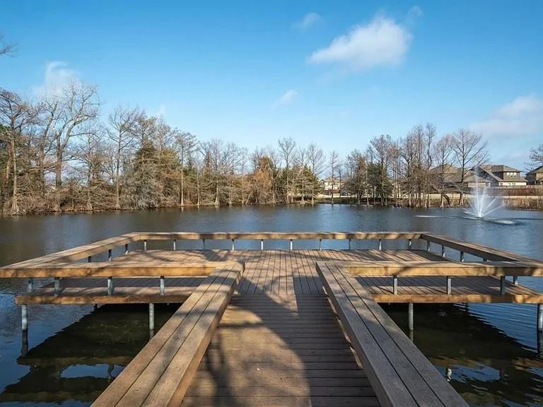 5582 Yarborough Drive Forney, TX 75126 - Photo 29 of 29 a view of a lake with chairs