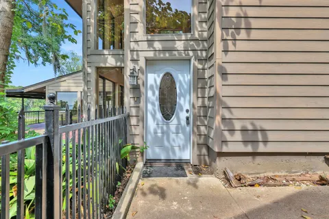 a view of a house with a small garden
