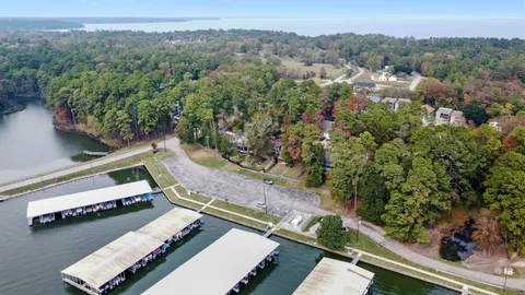 an aerial view of a residential houses with city view and mountain view