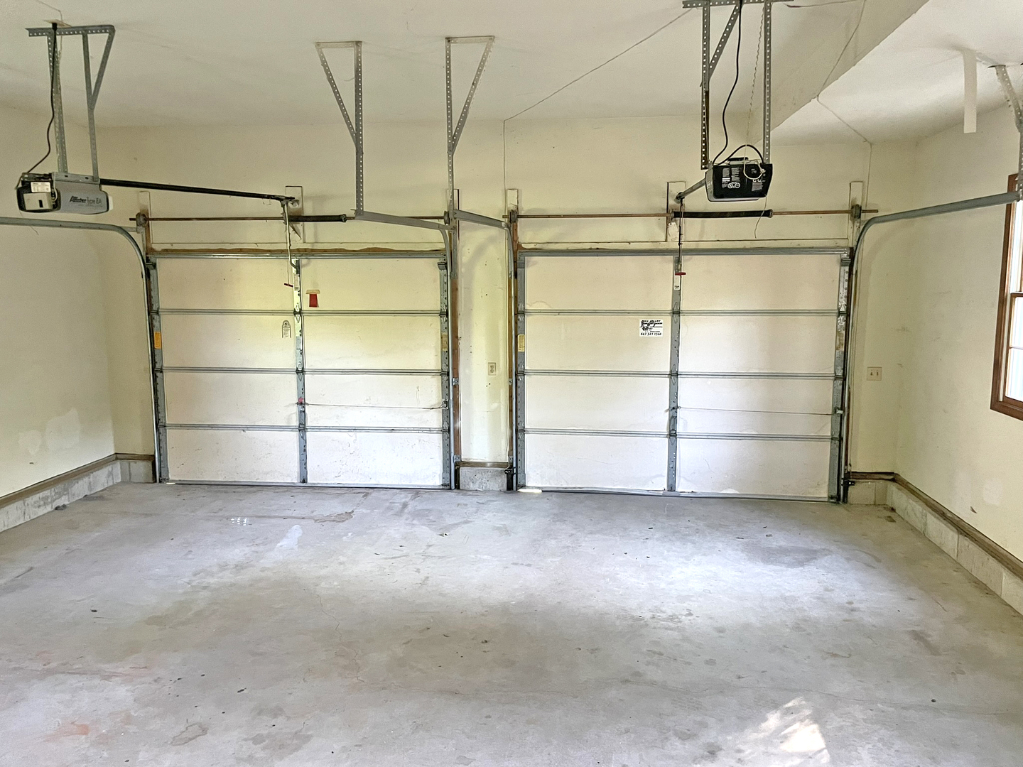 8914 Mason Hill Road Woodstock, IL 60098 - Photo 7 of 26 a view of an empty room with empty racks