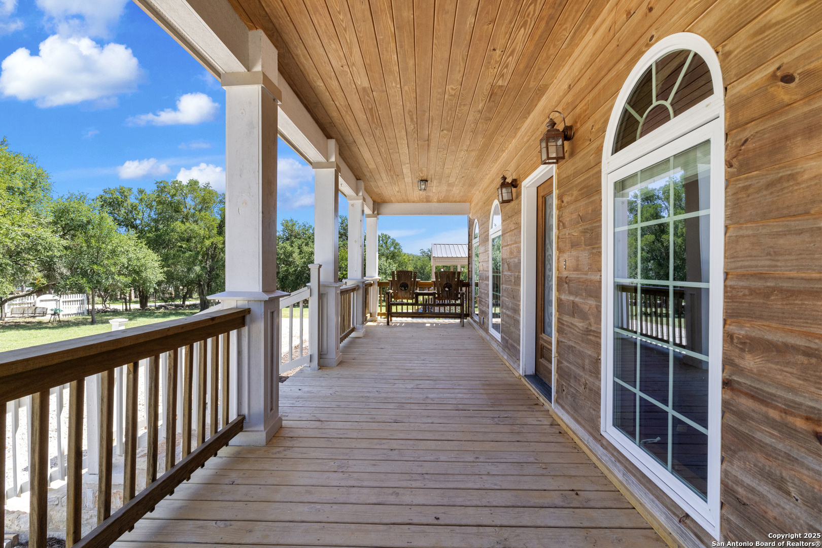 7040 Old Spring Branch Road Spring Branch, TX 78070 - Photo 3 of 43 a view of a house with a porch