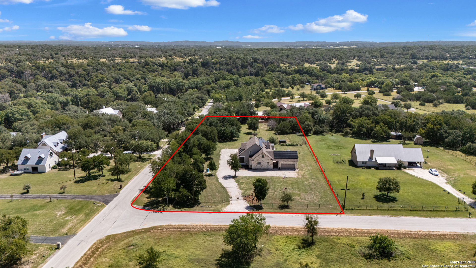 7040 Old Spring Branch Road Spring Branch, TX 78070 - Photo 37 of 43 an aerial view of residential houses with outdoor space