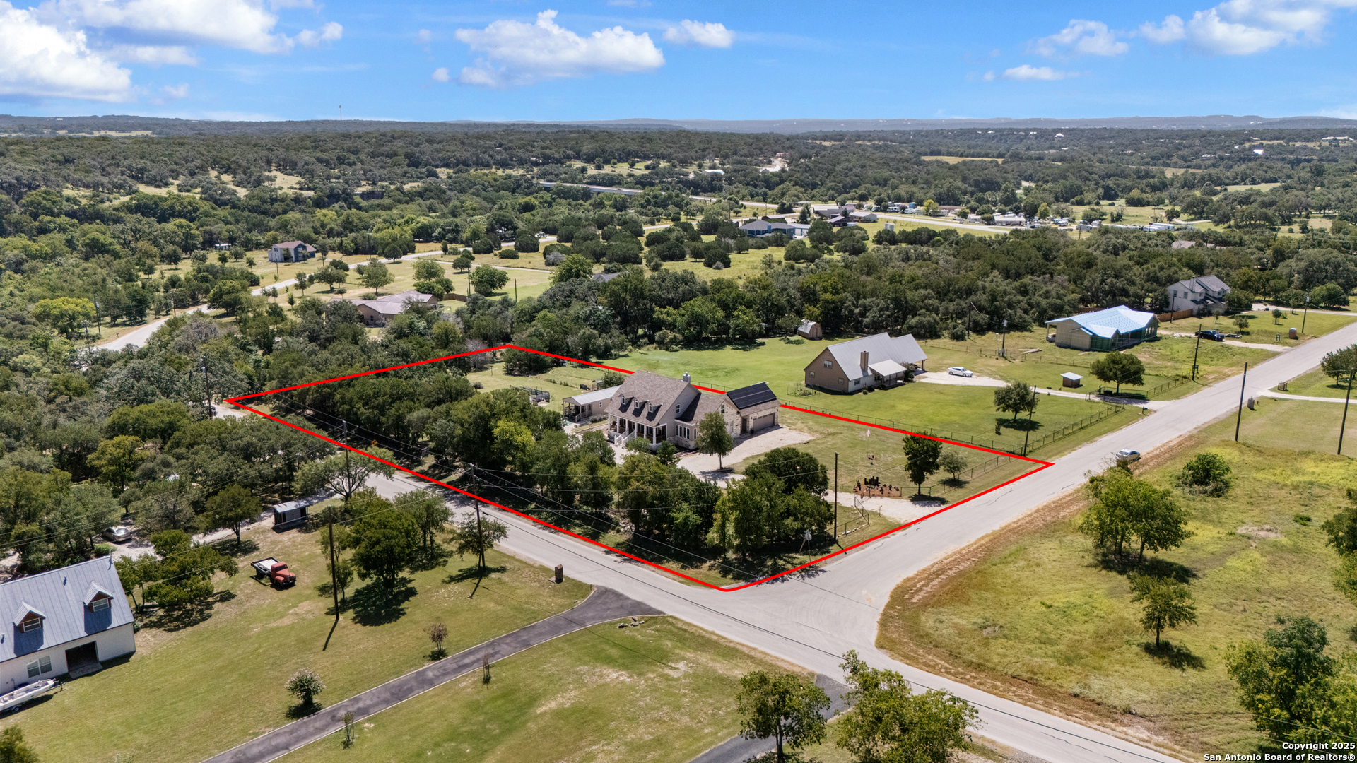 7040 Old Spring Branch Road Spring Branch, TX 78070 - Photo 39 of 43 an aerial view of residential houses with outdoor space