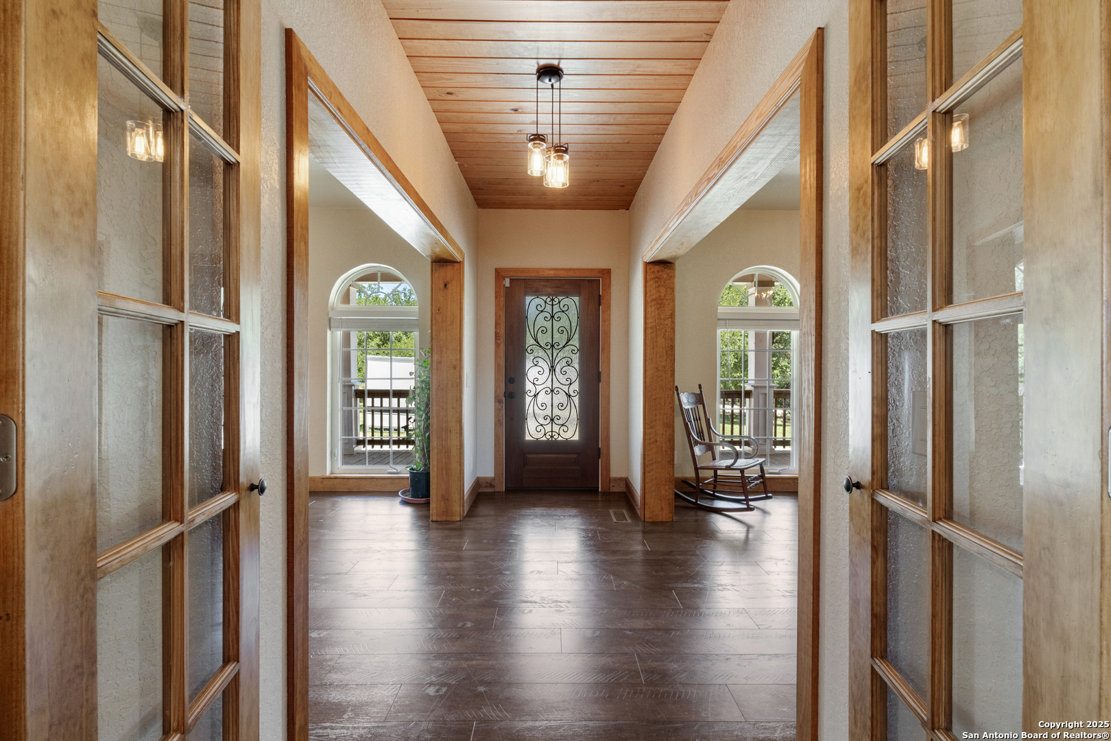 7040 Old Spring Branch Road Spring Branch, TX 78070 - Photo 4 of 43 a view of entryway with livingroom and wooden floor