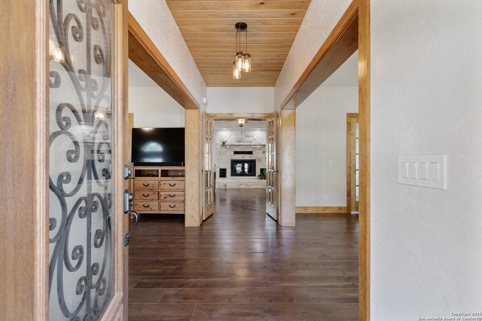 7040 Old Spring Branch Road Spring Branch, TX 78070 - Photo 5 of 43 a view of living room with furniture and flat screen tv