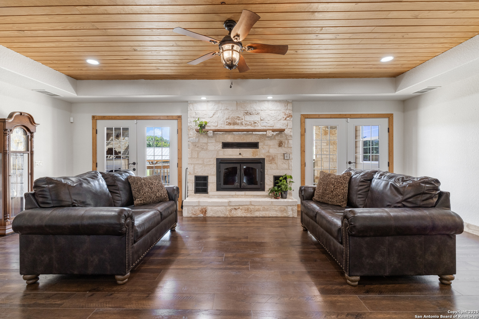 7040 Old Spring Branch Road Spring Branch, TX 78070 - Photo 6 of 43 a living room with furniture and a fireplace