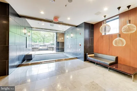 a bathroom with a tub and a shower
