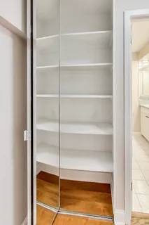 a view of a balcony with chairs