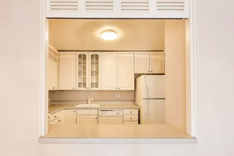 a picture of a bathroom with a sink and a window