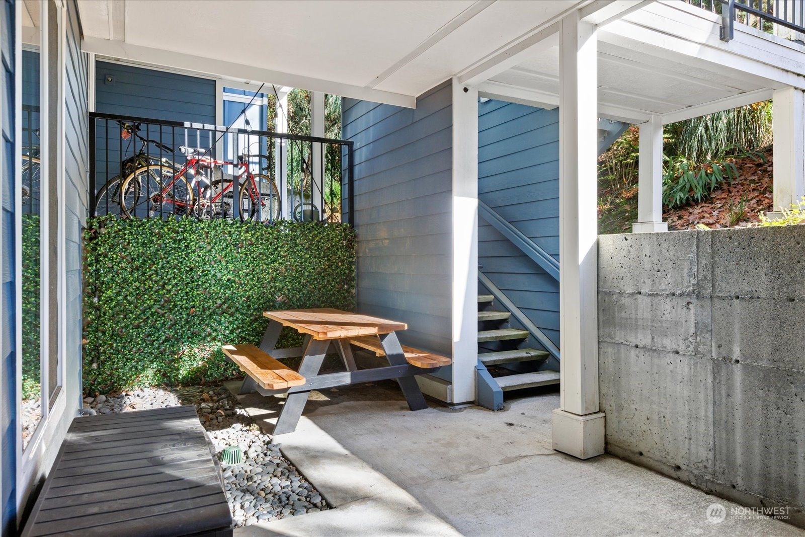 3915 243rd Place Southeast, Unit K103 Bothell, WA 98021 - Photo 21 of 36 a view of entryway with outdoor seating