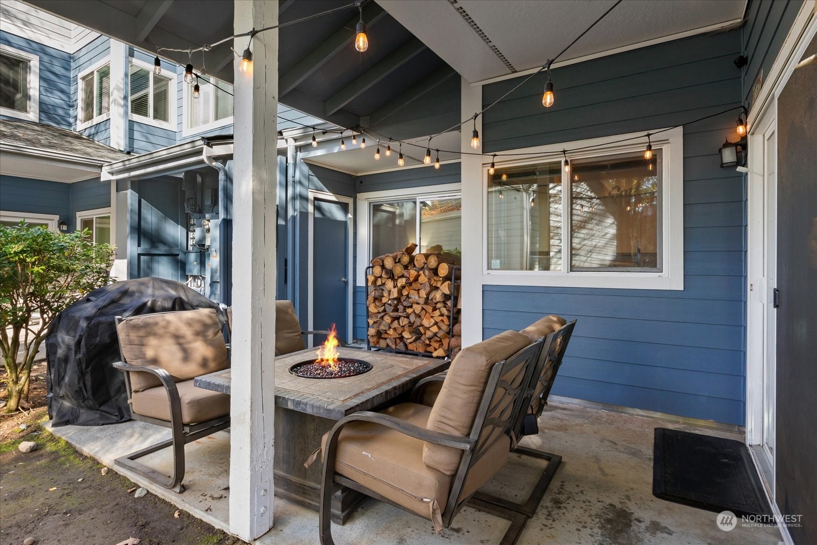 3915 243rd Place Southeast, Unit K103 Bothell, WA 98021 - Photo 22 of 36 a view of a chairs and table in a patio