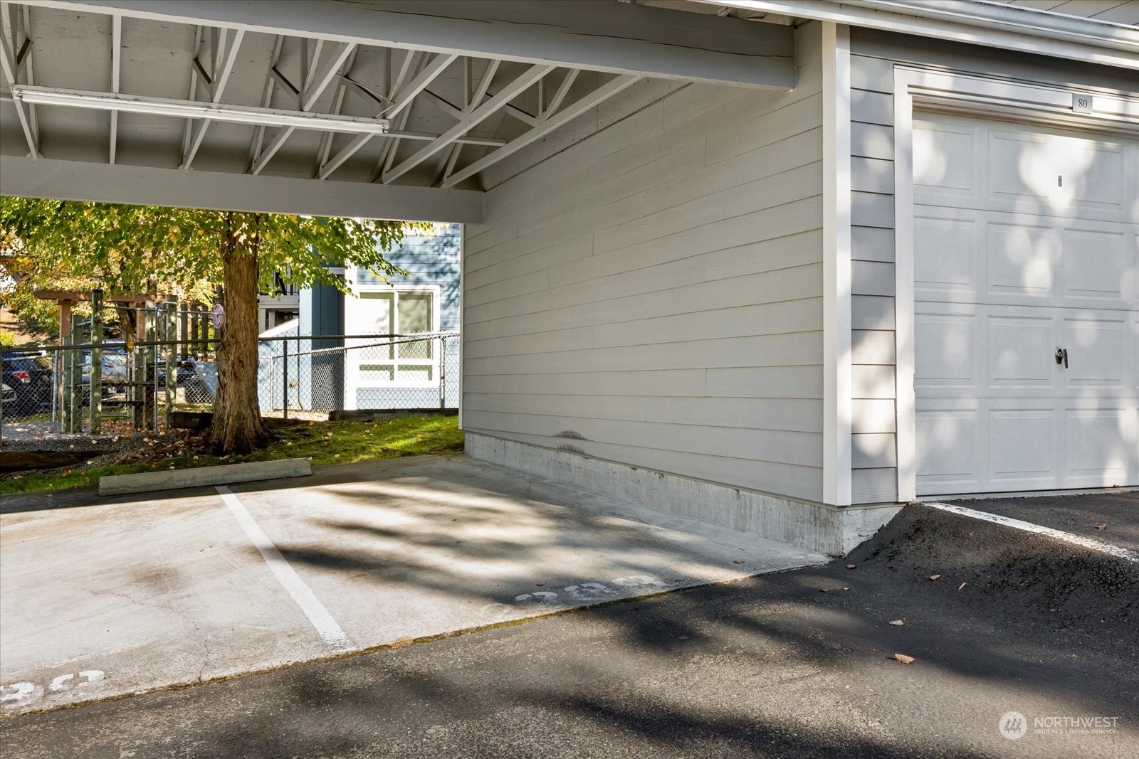 3915 243rd Place Southeast, Unit K103 Bothell, WA 98021 - Photo 25 of 36 a view of a house with a street